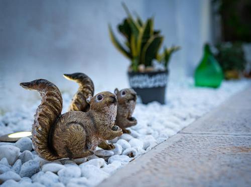 a group of figurines of three squirrels on rocks at Il Salento di Fioravante in Specchia Gallone