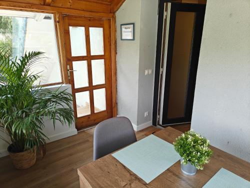 a dining room with a table and a chair at Anna's Residence 2 in Budapest