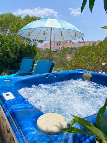 Villa by the sea with jacuzzi, garden & park view