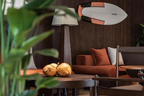 a living room with a couch and a table at Blossom Harbor Riyue Bay Wanning in Wanning