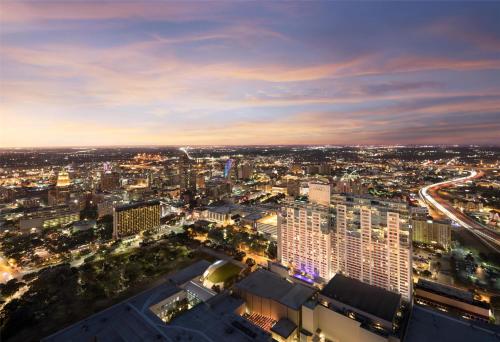 an aerial view of a city at night at Grand Hyatt San Antonio River Walk in San Antonio