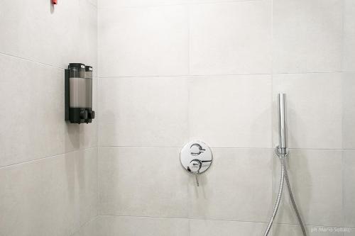 a shower in a bathroom with a shower at Casa Sollai in Monserrato