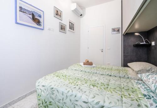 Letto o letti in una camera di Casa Lauretta
