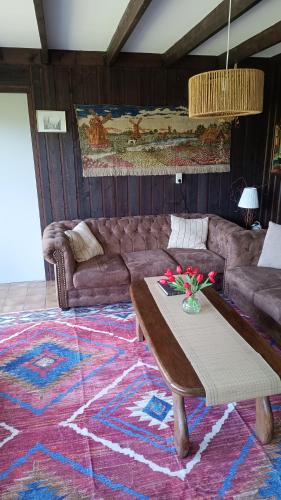 Posezení v ubytování Vakantiehuis Friedeburg