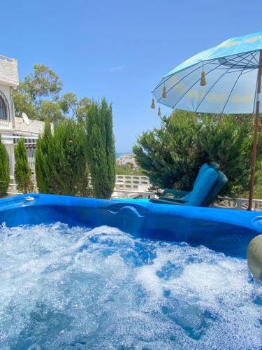 Villa by the sea with jacuzzi, garden & park view
