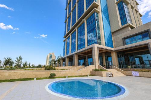 Πισίνα στο ή κοντά στο Hilton Samarkand Regency