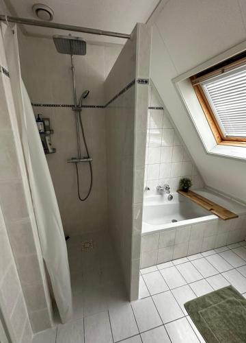 Ένα μπάνιο στο Recreatie Woning Drenthe