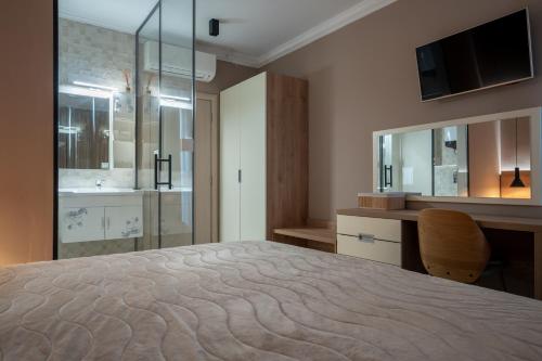 Ένα μπάνιο στο NEA Apartments