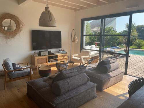 Photo de la galerie de l'établissement Villa avec piscine chauffée, à La Baule