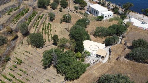 an aerial view of a building with a clock on it at The Krani in Mandrakion
