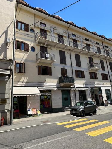 a car parked in front of a building at Montecarlo house vacation in Luino