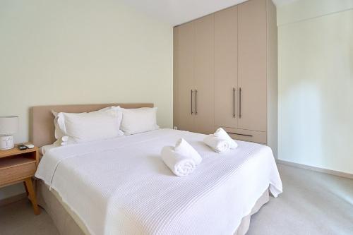 Кровать или кровати в номере Zoe's Luxury Apartment