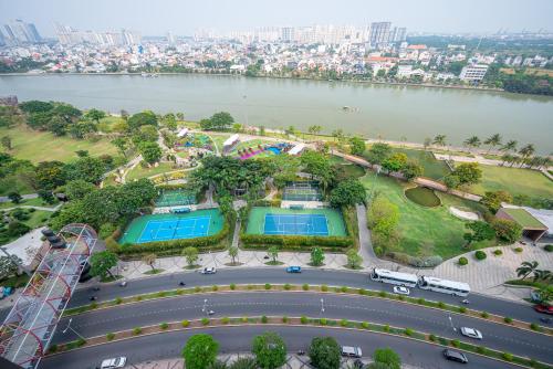 an aerial view of a park next to a river at Landmark Plus Vinhomes CityView Suite in Ho Chi Minh City