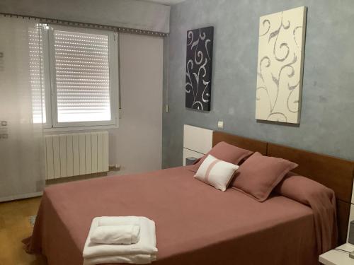Ένα ή περισσότερα κρεβάτια σε δωμάτιο στο Casa Sabina