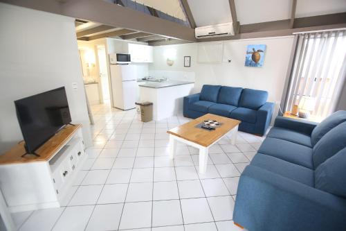 Kuchyň nebo kuchyňský kout v ubytování Kellys Beach Resort