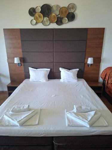 Ένα ή περισσότερα κρεβάτια σε δωμάτιο στο Guest House Skalite