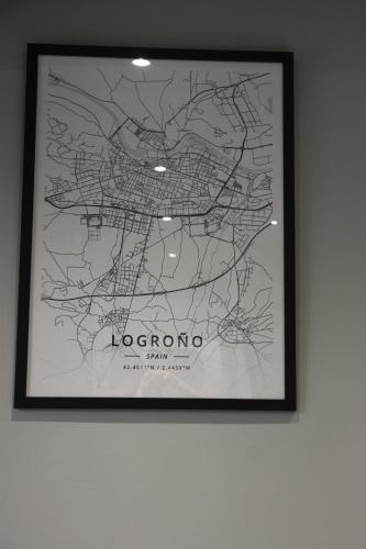 a framed picture of a map on a wall at Apartamento TROMPETA !!PARKING PRIVADO GRATUITO!! in Logroño