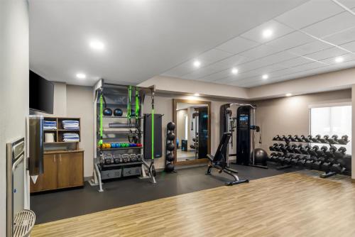 a fitness room with a gym with weights at Hampton Inn Jacksonville Ponte Vedra in Jacksonville Beach