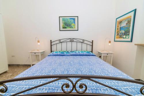 Posteľ alebo postele v izbe v ubytovaní RobertONE Guest House