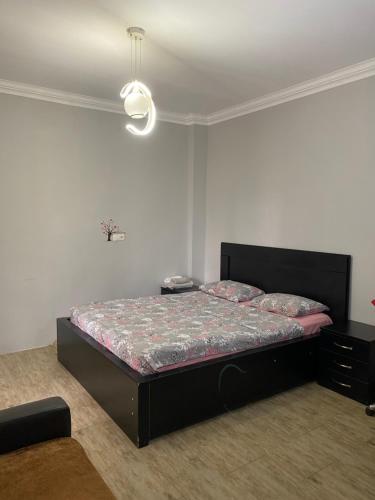 Postel nebo postele na pokoji v ubytování Cherqe Guest House