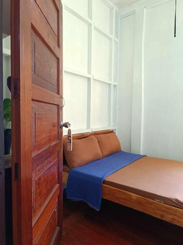 Postel nebo postele na pokoji v ubytování A-Seven House Sagada