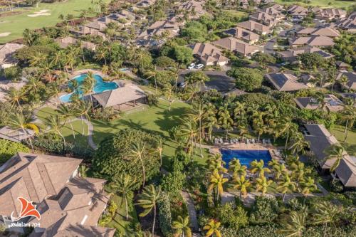 an overhead view of a resort with a pool and trees at 2BR bright quiet condo in Kulalani sleeps 6 in Waikoloa