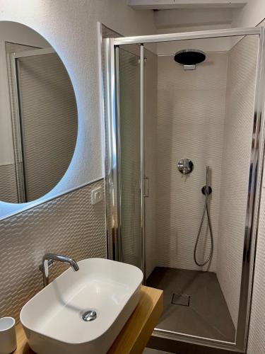 a bathroom with a sink and a shower at Nicolina 5 Il Cappero in Vernazza