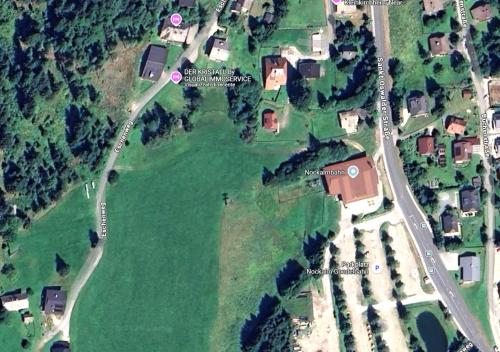 a map of a house and a road at Der Kristall by Globalimmoservice in Bad Kleinkirchheim