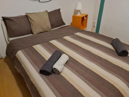 Posteľ alebo postele v izbe v ubytovaní Spark Apartment