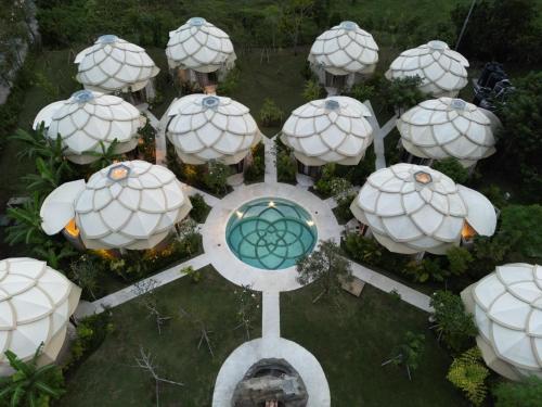 an overhead view of domes at the epcot spheres at Nuanu Suites & Accommodations in Tanah Lot