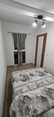 Postel nebo postele na pokoji v ubytování Green Oasis Apartments