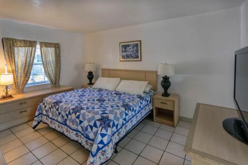 Katil atau katil-katil dalam bilik di Richard's Motel Extended Stay
