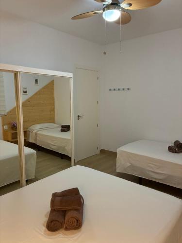 Postel nebo postele na pokoji v ubytování Villa El Hogar