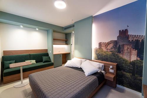 Postel nebo postele na pokoji v ubytování CASA LORENZO