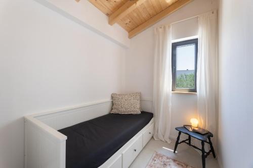 Katil atau katil-katil dalam bilik di Peace & Pool in Olive Grove