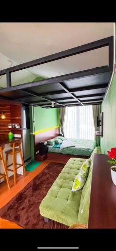 Una cama o camas en una habitación de Pavilion rooftop lantai 3