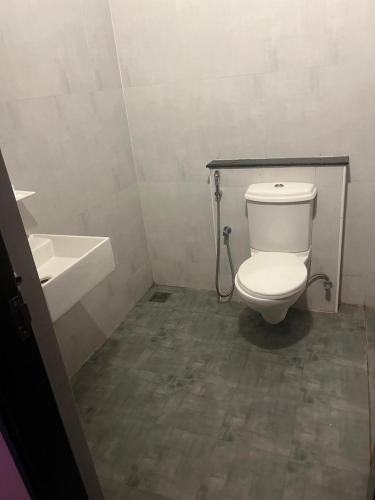 Koupelna v ubytování Aaiyana room stay
