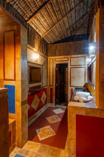 a bathroom with a sink and a counter top at Dayo Hotel in Flecheiras