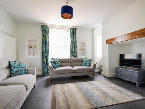 a living room with a couch and a flat screen tv at Salt House - Uk43012 in Berkeley
