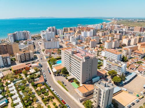 an aerial view of a city with the ocean at Prestige Goya Park in Roses