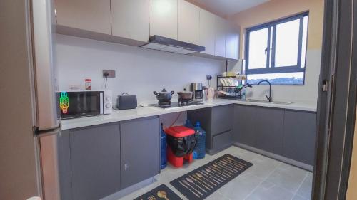 Kuchyň nebo kuchyňský kout v ubytování Bela Getaway Homes Two bedroom all ensuite Apartment