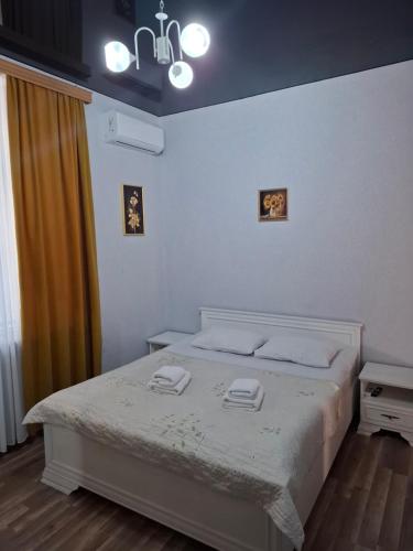 Una cama o camas en una habitación de Mango's Guesthouse