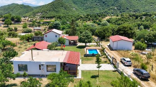 an aerial view of a house with a yard at Guest House MICAJ in Himare