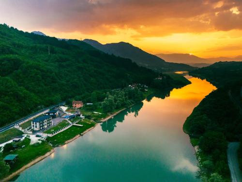 an aerial view of a river at sunset at Hotel Alibabin Raj in Konjic