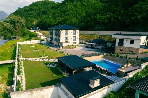 an aerial view of a house with a swimming pool at Hotel Alibabin Raj in Konjic
