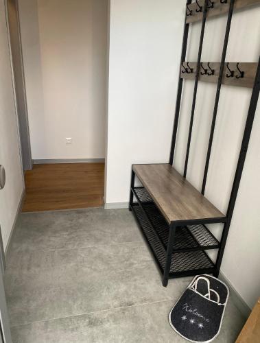 a room with a bench in the corner of a room at Diamond Houses in Námestovo