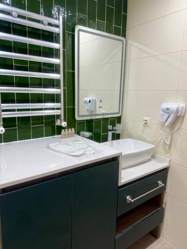 Koupelna v ubytování Sun & Style 1BR Apartment