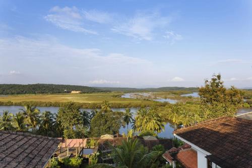 an aerial view of a river with houses and trees at Tropical Woods 7BR 2Villas Pvt Pool Cook Car in Bardez