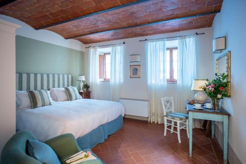 Postel nebo postele na pokoji v ubytování B&B Borgolecchi , Lecchi in Chianti
