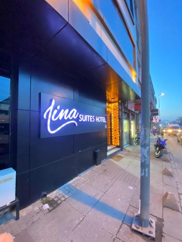 a sign on the side of a building at Lina Suit Hotel in Istanbul
